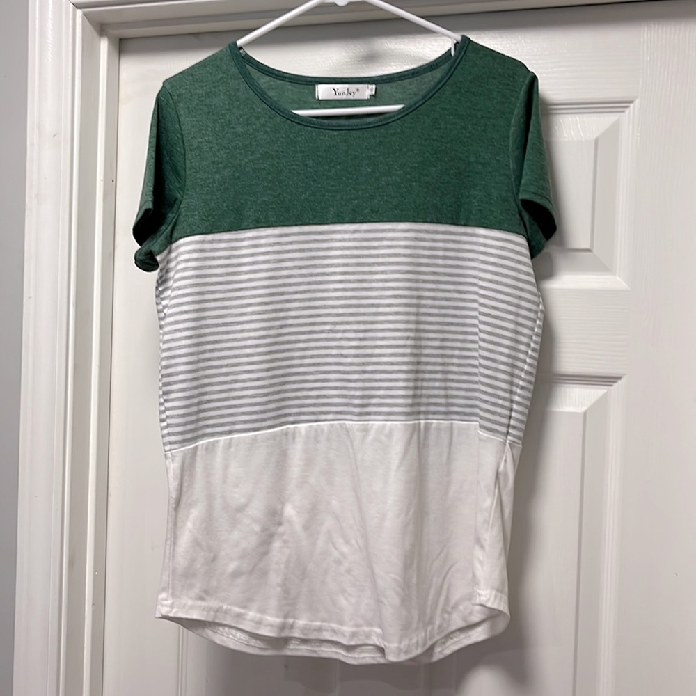 Small, color block shirt.